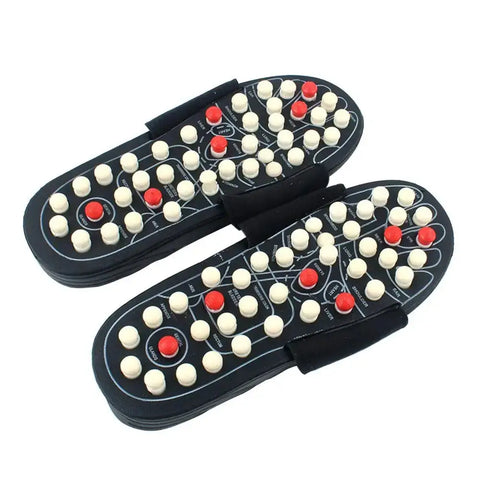 Acupressure foot massager slippers featuring nodules for targeted reflex point stimulation and stress relief.